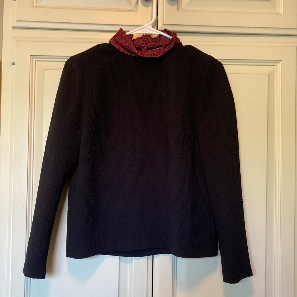 Beautiful women’s blouse with lace mock neck